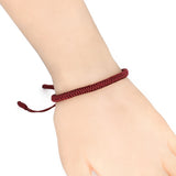 Bracelet tressé porte-bonheur