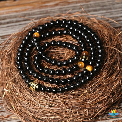 Mâlâ Double protection en Oeil de Tigre & Onyx